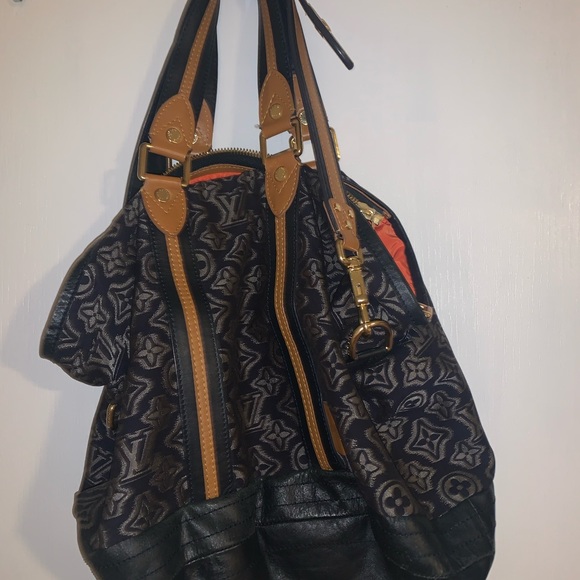 LOUIS VUITTON
Limited Edition Navy Jacquard Monogram Fabric Aviator Bag - Picture 8 of 10